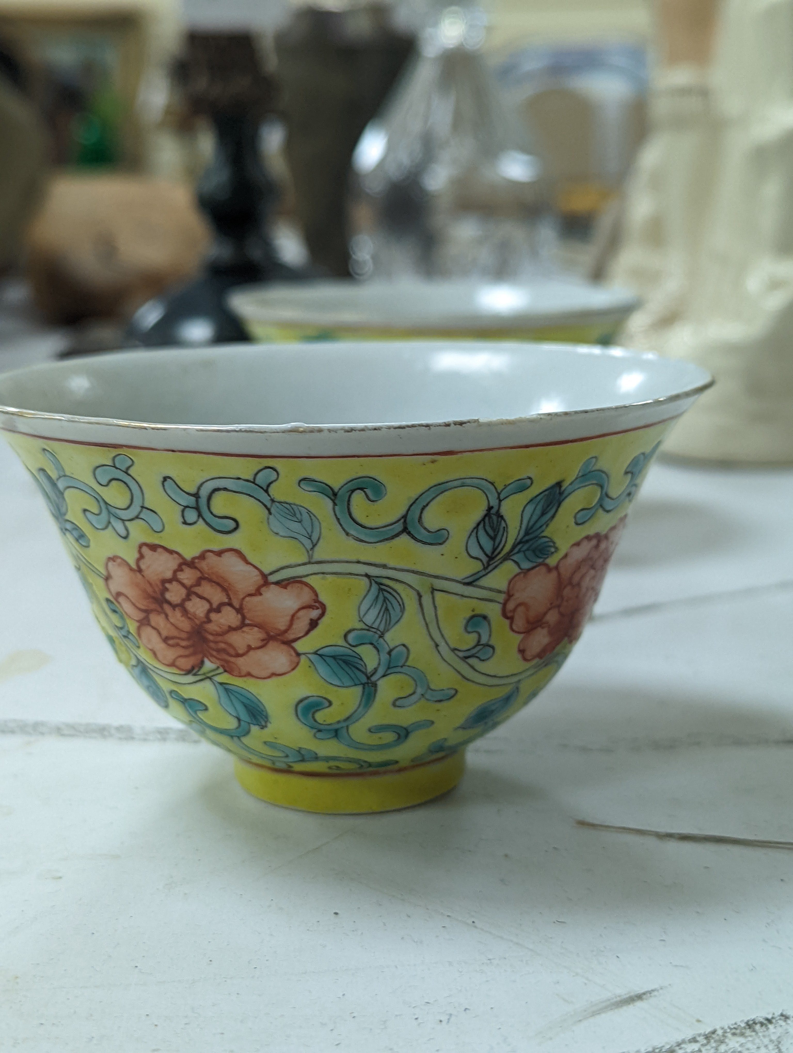A group of Chinese porcelain, 19th /20th century, to include a pair of yellow ground bowls, 10.8 cm diameter, a blue and white vase, Xuande mark, a similar bowl and vase, and a champleve enamel bronze koro and cover